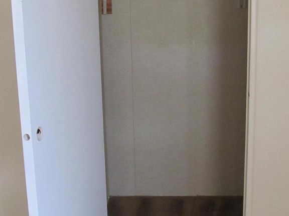 Master bed room walk in closet