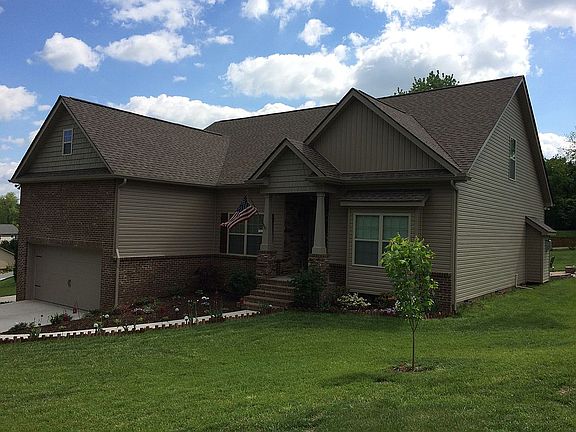 Flat driveway and yard