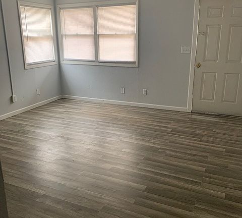 Spacious living room, with new hardwood flooring