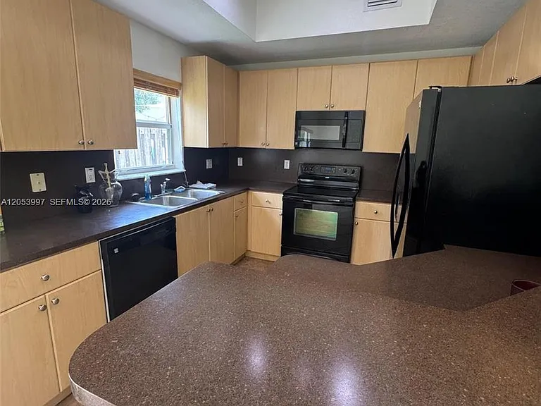 8908 SW 223rd Ter #8908 — Photo 3