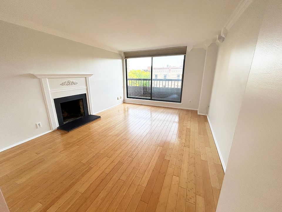 Living Area, Fireplace & Balcony