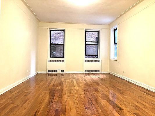 1st image of 8836 Elmhurst Ave #2/K