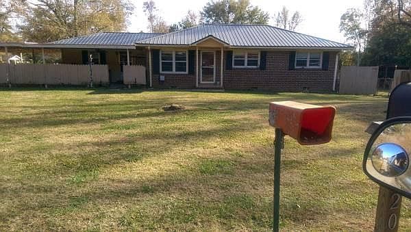 Front yard, Metal roofing placed on home 2009.