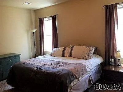 primary bedroom with furniture