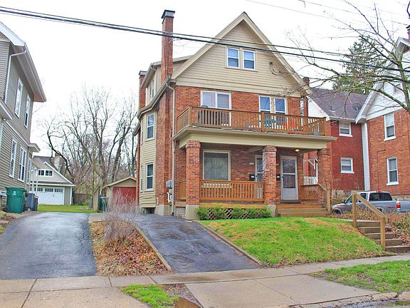 The highly sought after Portsmouth Ave in Hyde park. Your own mailing address (no apartment numbers!), keyless keypad entry, and PRIVATE driveway. And check out that HUGE private 2nd level balcony with French doors!