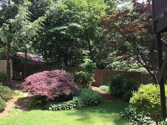 View of landscaped back yard from the deck