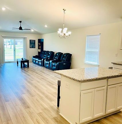 Vaulted ceilings throughout kitchen and living room, full of natural light, open concept!