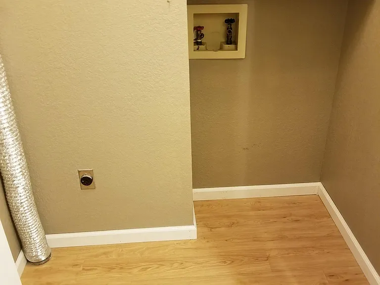 Apartment In Unit - Laundry on the left of the Hallway