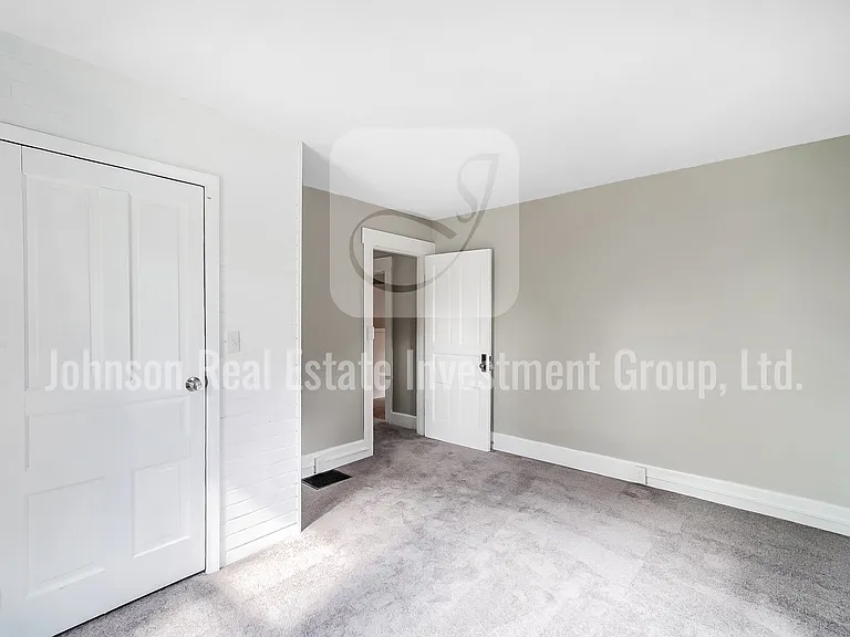 Spacious second upstairs bedroom.