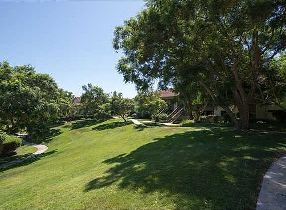 Large areas covered with grass for picnics, and kids to play