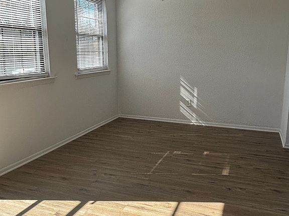 Step into a dining/living room from the front door.
