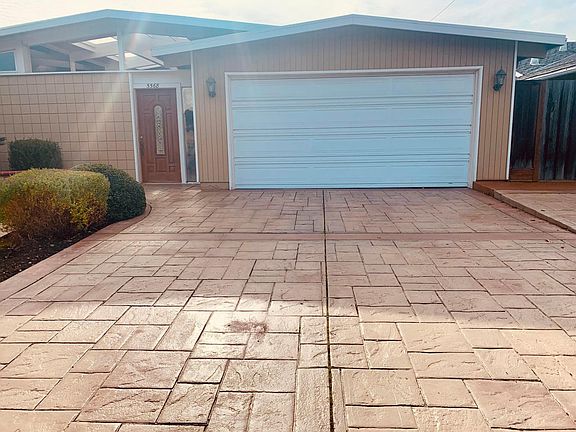 Front of house with 2-car garage