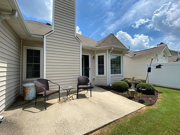 Back of house showing patio