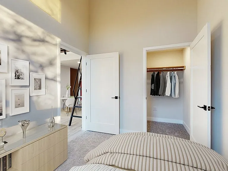 Comfortable Bedroom with Attached Closet in One-Bedroom Apartment