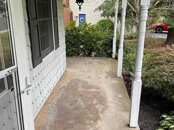 Full Front Porch. 26 ft.