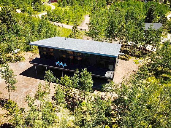 The Air Line is surrounded by a lush, green aspend forest.