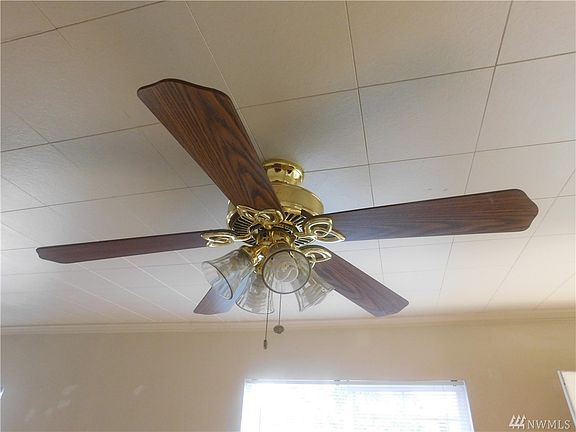 There are two of these designer ceiling fans in the living room.