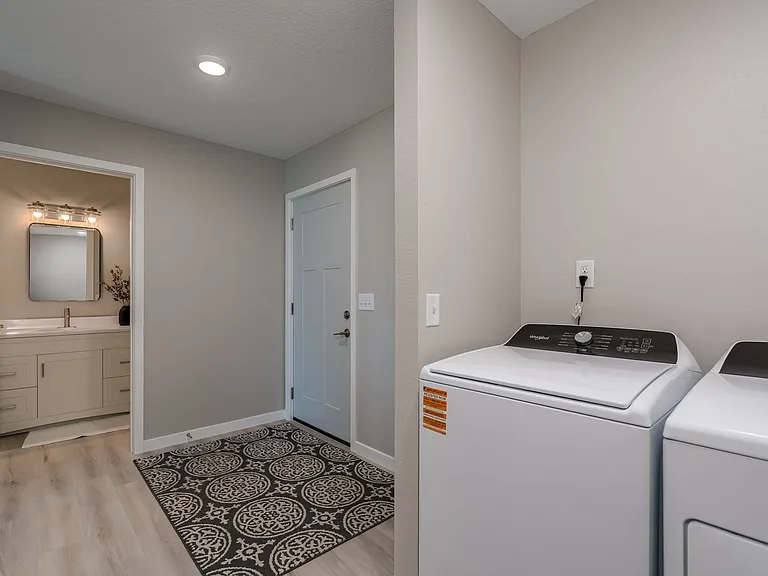 Laundry included. Main floor Half Bath.