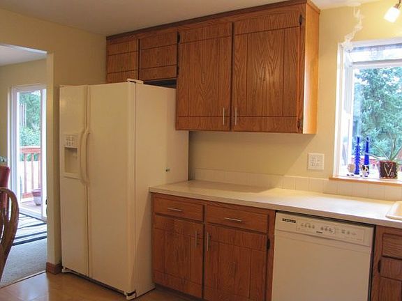 Garden window looks onto the deck and sound view.