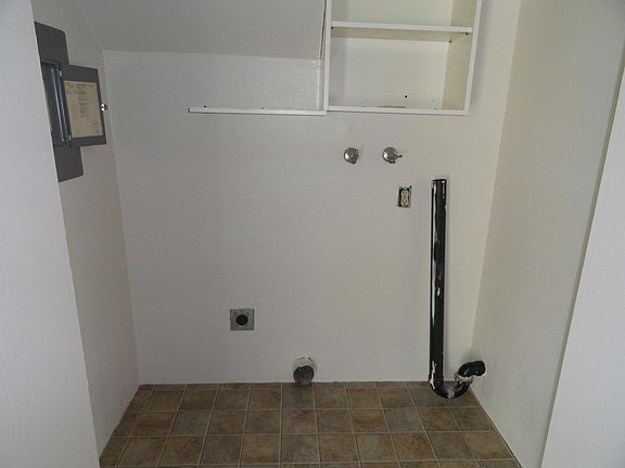 Laundry closet on ground floor. Tenants have left working washer/dryer that becomes yours on occupancy.