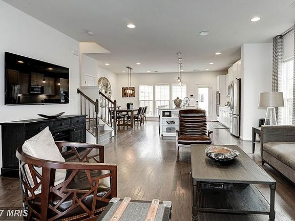Open concept and beautiful hardwoods, oh my!