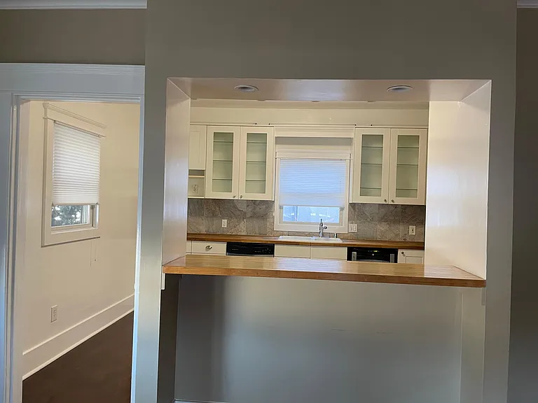 bar area view to kitchen