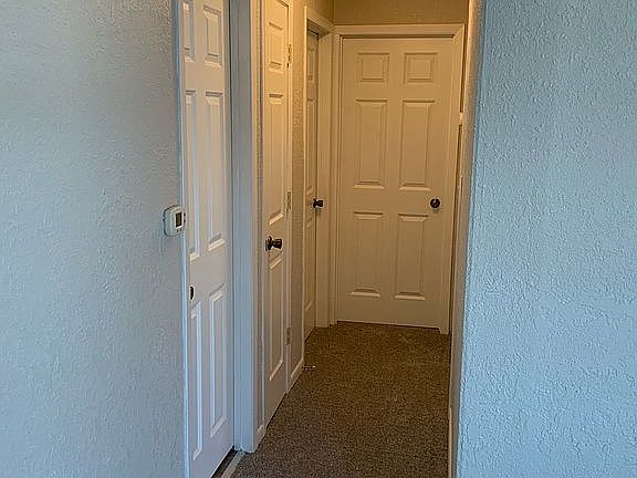 Hallway to bedrooms and bath