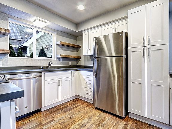 Lower level kitchen with all new cabinetry, stainless steel