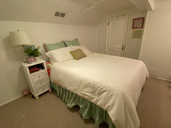 Bedroom with access to the walk in closet and laundry.