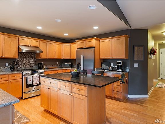 The chef in the family will not be disappointed with this well appointed kitchen.  Nice island for prepping meals and there is a large pantry for storage.