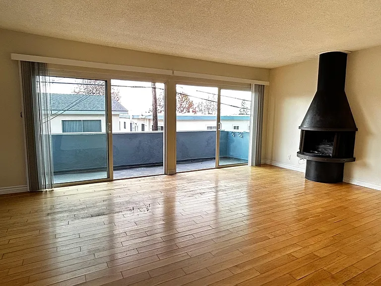 LIVING ROOM AND BALCONY