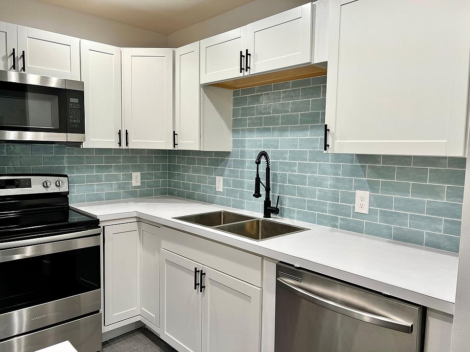 Custom glass tile backsplash.