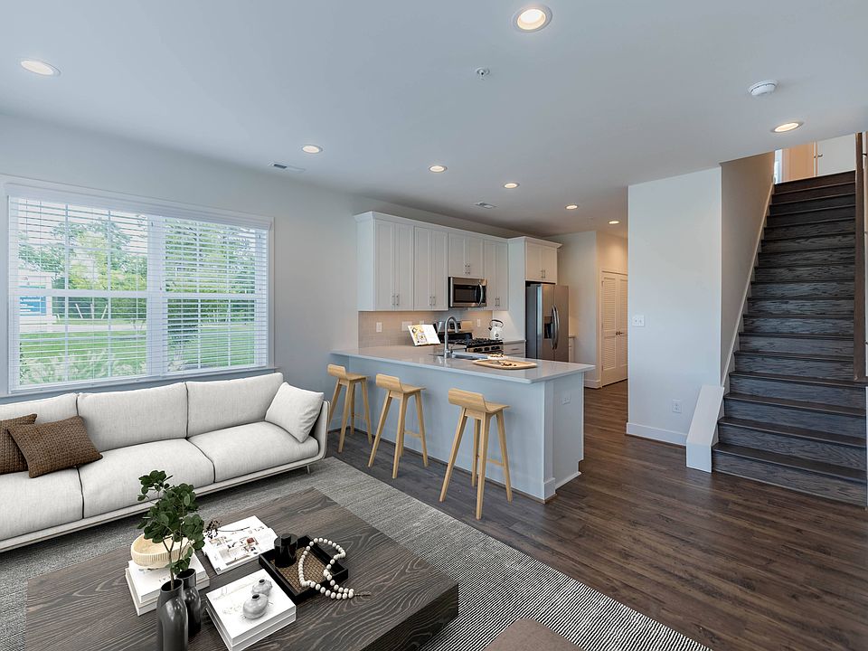 D1 Exterior Lower Level Home Virtually Staged Living Room and Kitchen