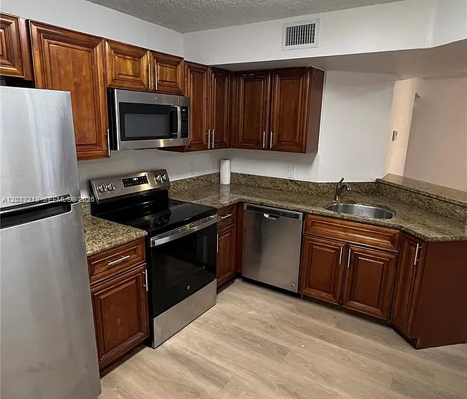 8851 Wiles Rd #108 — Photo 8