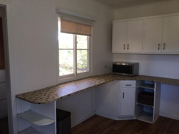 Kitchen measures 9 ft by 14 ft.