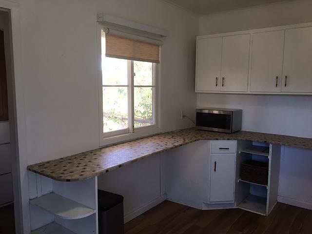 Kitchen measures 9 ft by 14 ft.