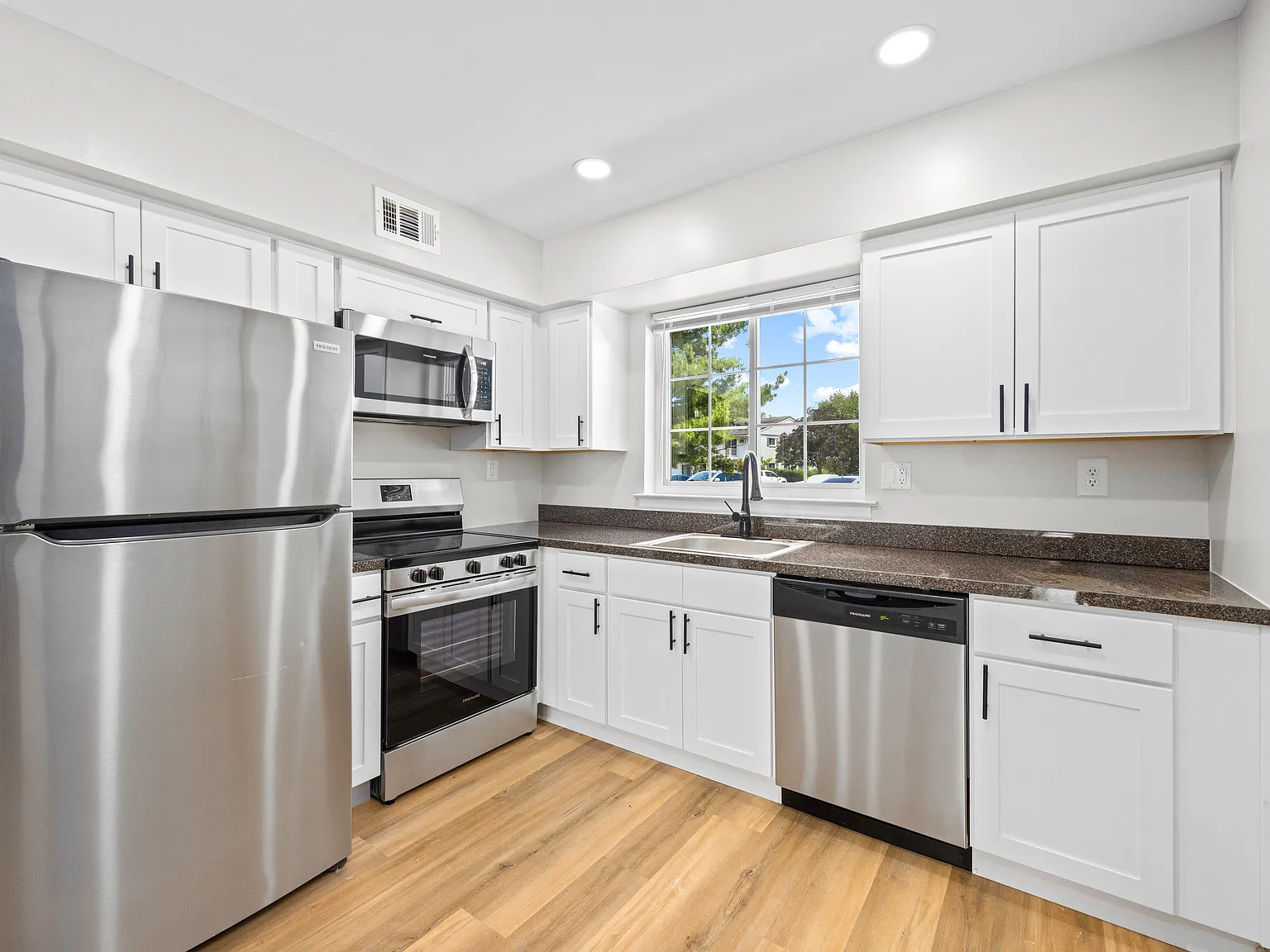 Rustic Village Apartments & Townhomes — Photo 3