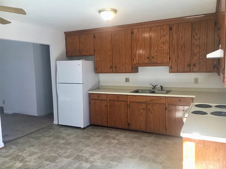 Kitchen with new fridge and dishwasher