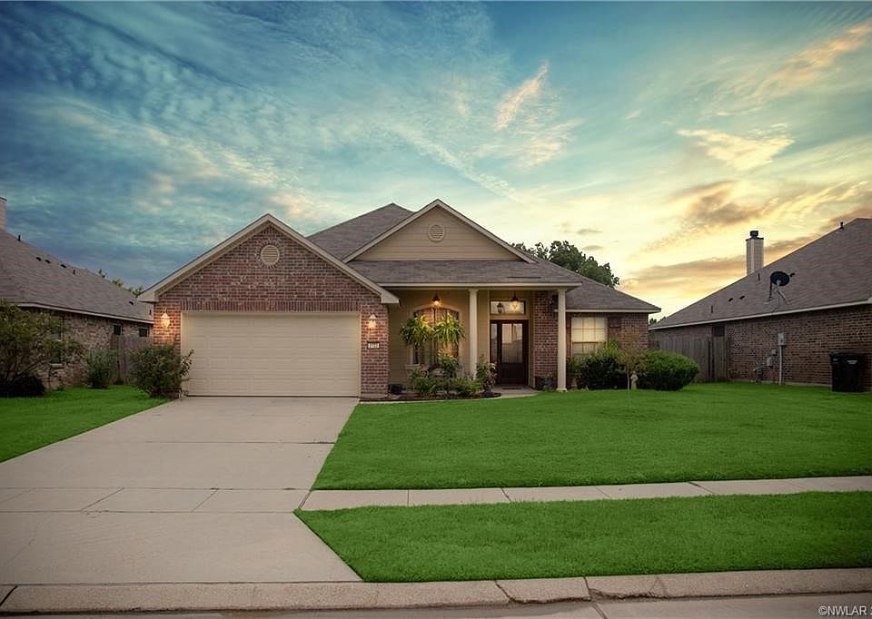 Great curb appeal and an inviting front porch welcome you to 2122 Sweet Bay Circle in Legacy.