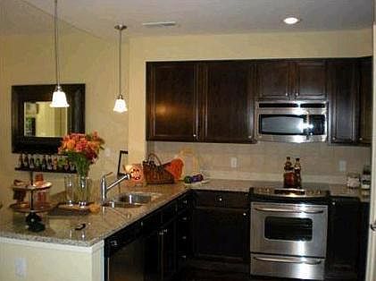 kitchen with stainless steel appliances and granite counter