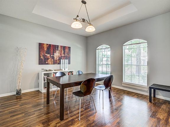 Formal dinning has a trey ceiling and is off the kitchen. This room is big enough for your dinning room furniture.