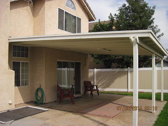 Large Covered Patio in a big Backyard