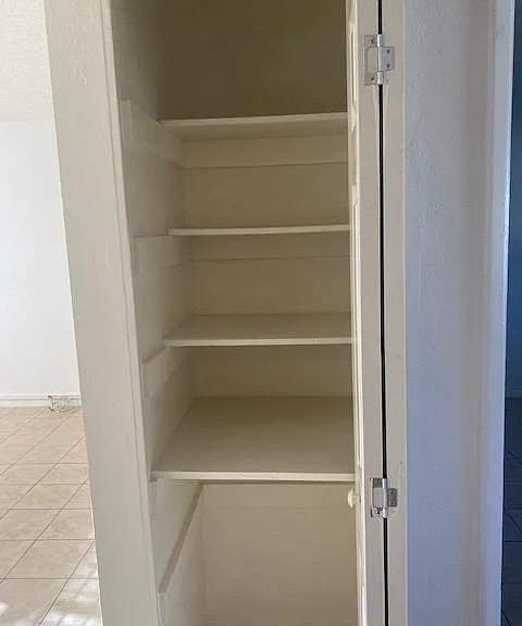 linen closet in hallway