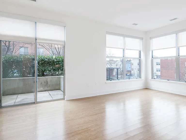Living Room with Balcony and Hard Surface Flooring
