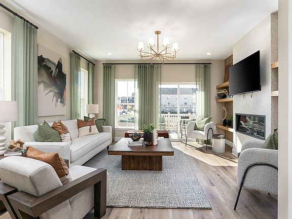 A cozy living room with large windows for natural light.