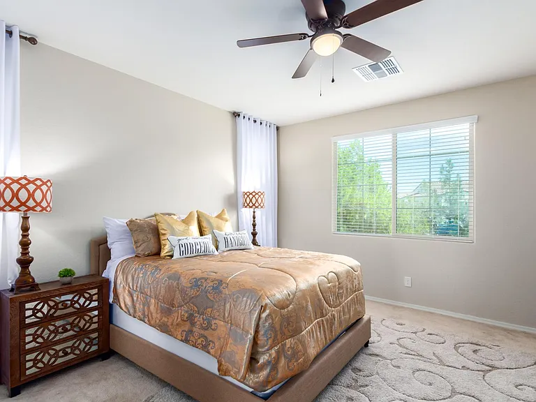 Large primary bedroom to park views.