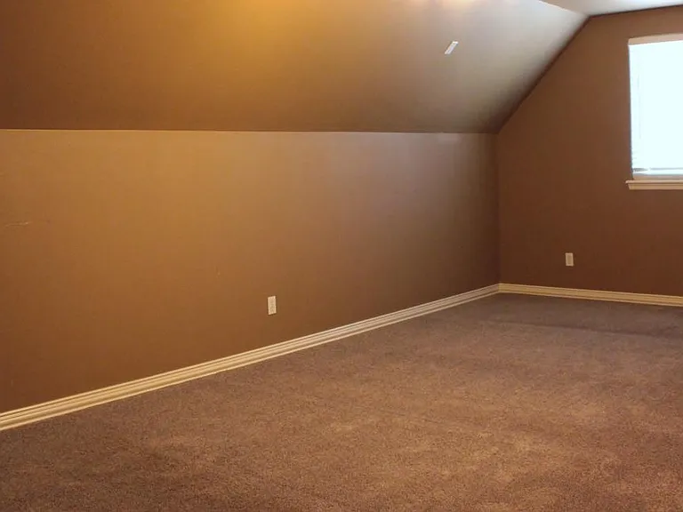 Bedroom #4 with Walk Out Attic Acccess