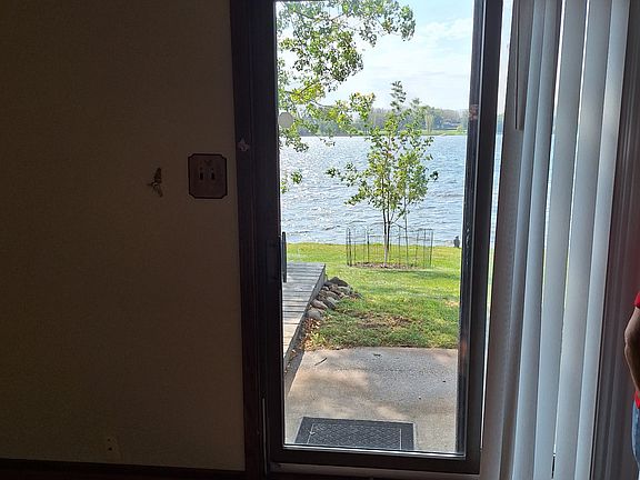 View from living room looking out door to get in basement.