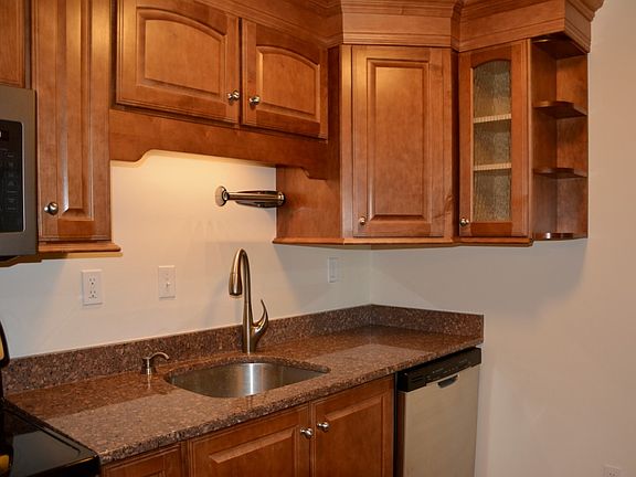 Glass front cabinet and open shelves to showcase special items