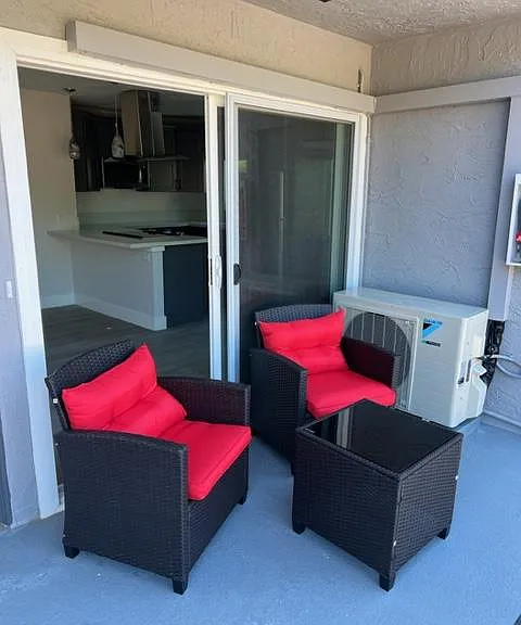 patio area directly off of the living room sliding glass door slider